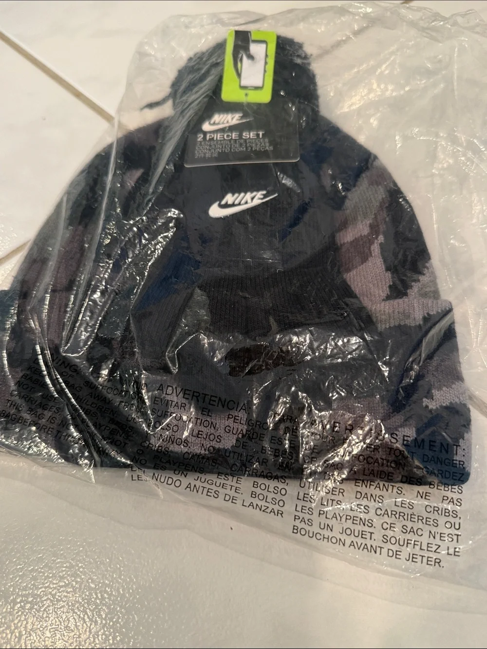 Nike Camo Black/Gray Knit Beanie with a black Pom-Pom. Black gloves to match.